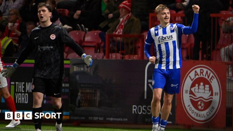 Irish Premiership: Ten-man Larne lose as Glentoran win to narrow gap at top